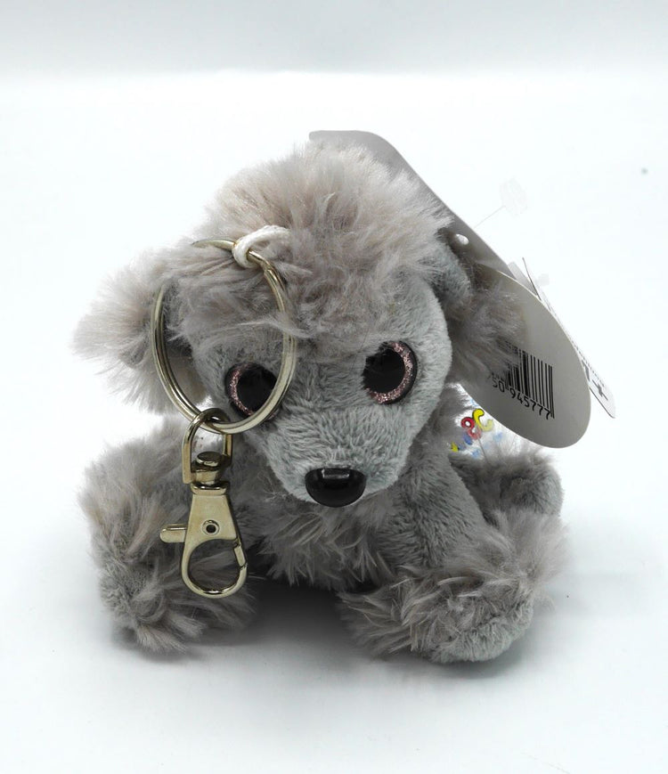 Anneau clé avec chien moelleux de 9 cm de haut