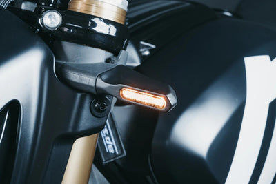 Indicateur de direction du motoïsme ressort