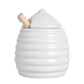 Pot de miel avec cuillère en bois