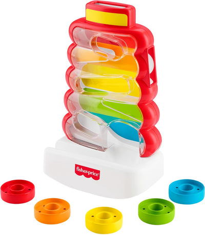 Anneaux roulants Fisher-Price dans une tour d'empilage bancale