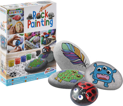 Creative Craft Group peignant des pierres