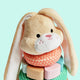 Lapin à empiler Hape - jouet à empiler pour bébé en 5 parties, bois de hêtre et anneaux sensoriels, à partir de 10 mois