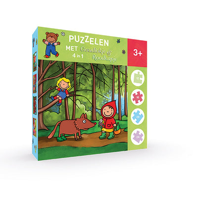 Clavis fait des puzzles avec Boucle d'Or et le Petit Chaperon Rouge. Casse-tête 4 en 1