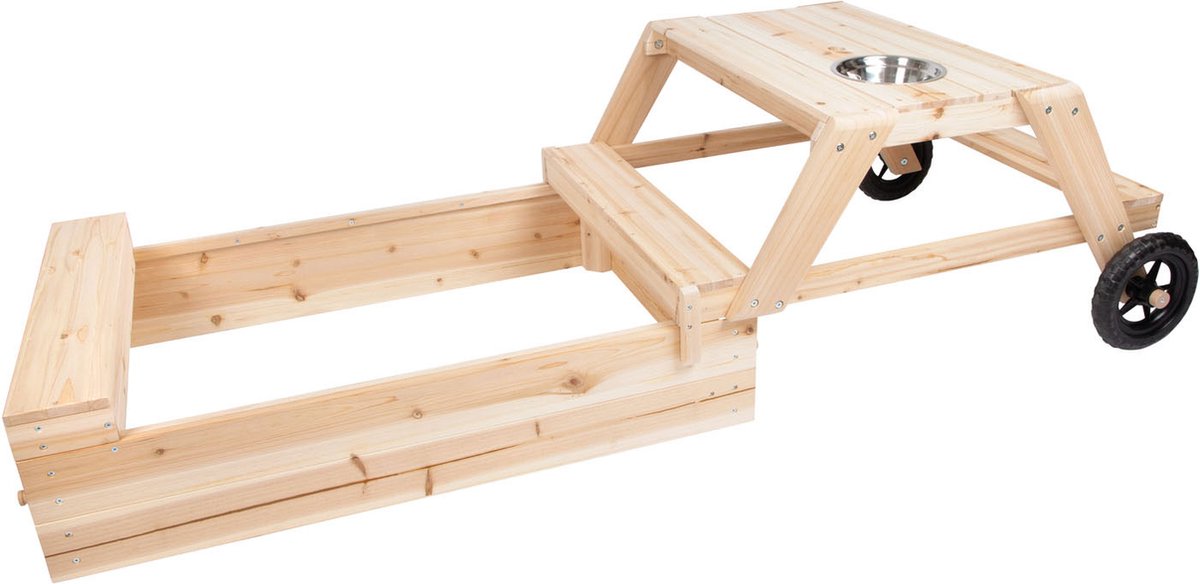Petit pied sableux avec coin salon et table moderne
