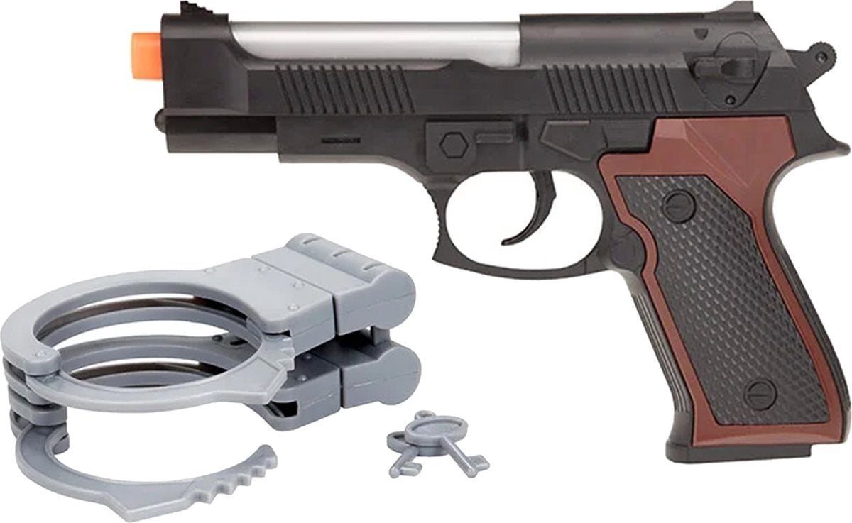 La police a mis des menottes et un pistolet avec de la lumière et du son