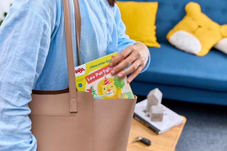Haba jeu éducatif Leo le lion de fête - carton de jeu coloré pour enfants.