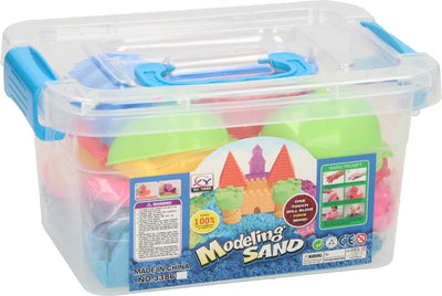 Jouez aux fruits de sable dans la boîte de rangement