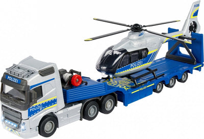Camion de grandette Volvo avec la police d'hélicoptère