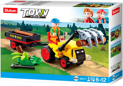 Tracteur Sluban avec troncs d'arbres