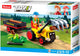 Tracteur Sluban avec troncs d'arbres