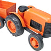 Tracteur de jouets verts avec remorque orange
