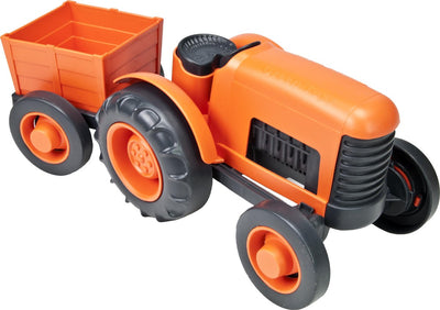 Tracteur de jouets verts avec remorque orange