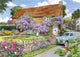 Maison des puzzles puzzle cottage glycine 250 pièces grande taille.