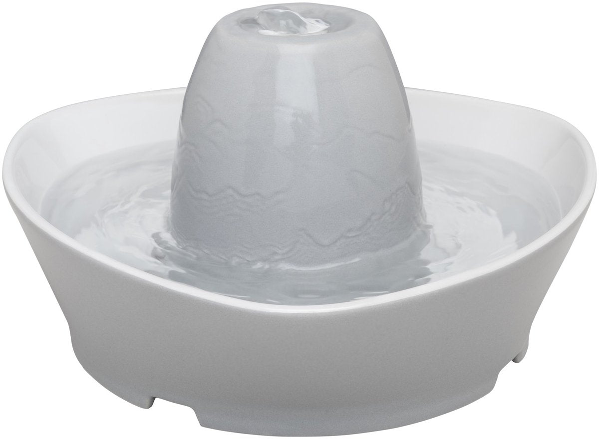 Fontaine pour animaux en céramique Petsafe ® streamside - fontaine à boire en céramique pour chats et petits chiens - l'eau bouillonne doucement sur la tour - accessible de tous les côtés grâce à sa conception - 1,8 litres - côté ruisseau