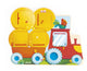 Janod - jeu découverte - tracteur avec trappes