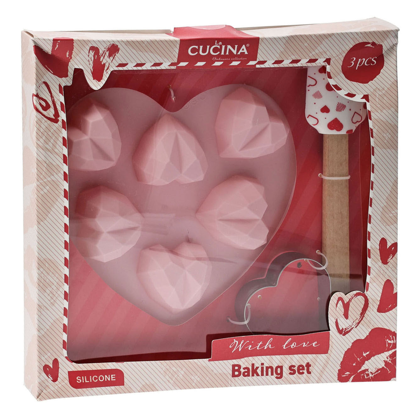 Set de pâtisserie comprenant un moule à gâteau, une spatule et un emporte-pièce