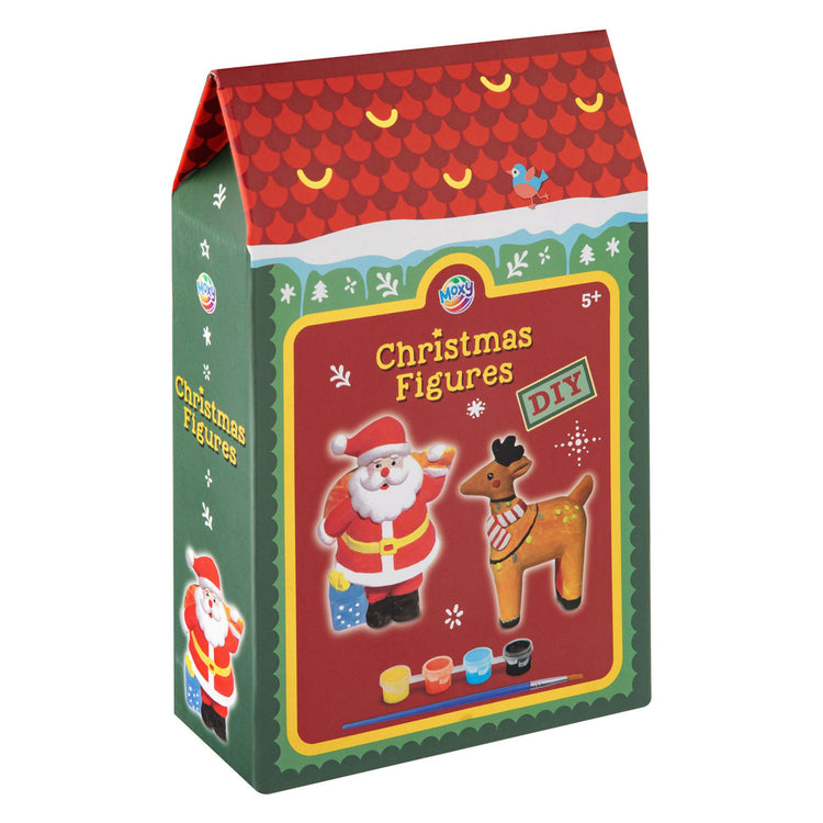 Un groupe d'artisanat créatif peint votre propre figurine de Noël - avec pinceau et peinture