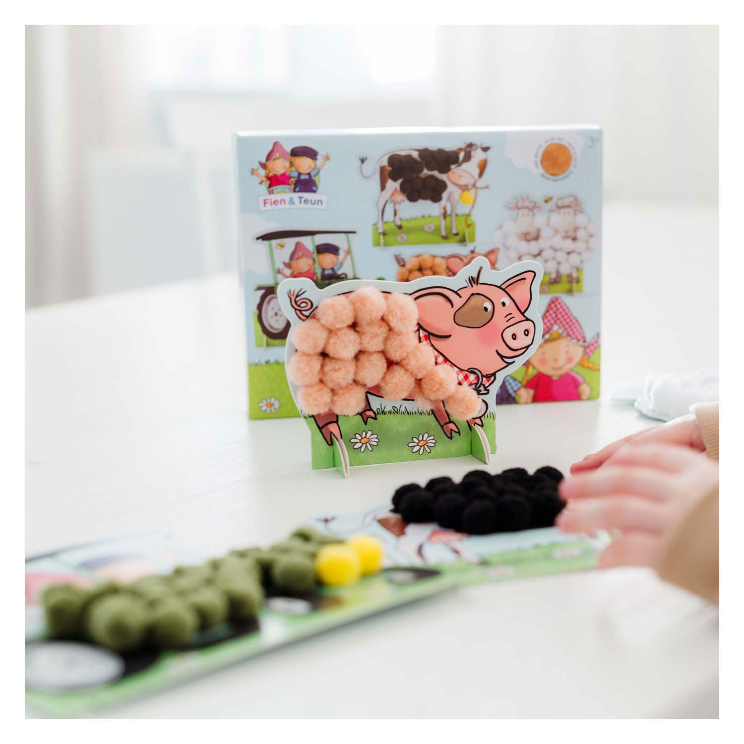 Toys Bambolino Fien Teun Pompom joue
