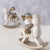 Boltze home Père Noël sur cheval à bascule résine h11cm