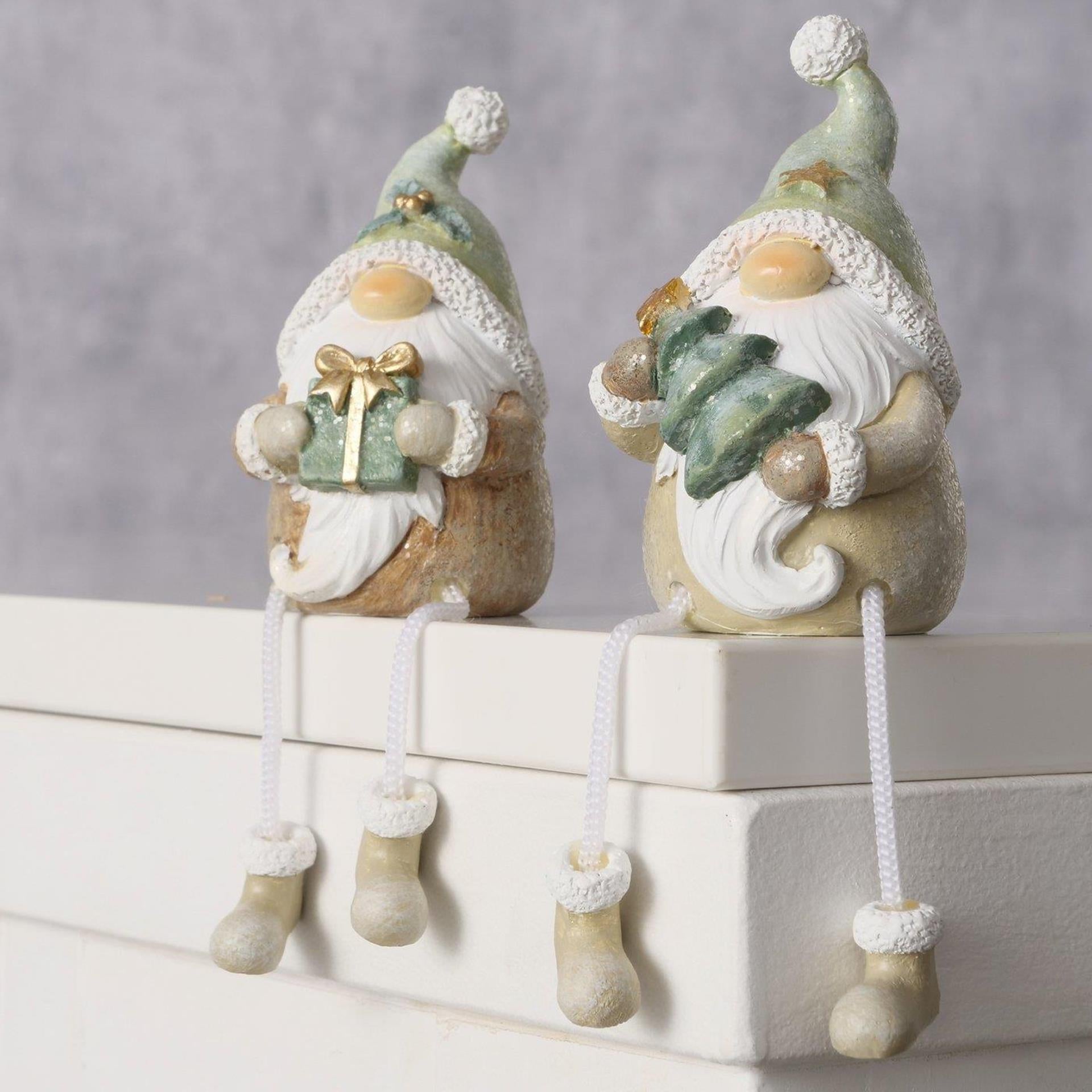 Nain de maison Boltze avec jambes pendantes