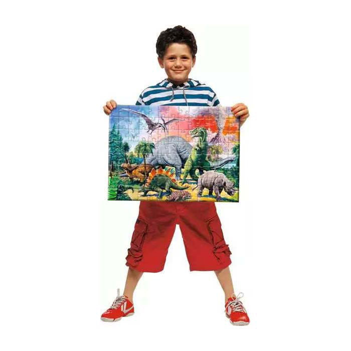 Puzzle de Ravensburger entre les pièces de dinos 100 xxl