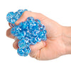 Prépasser la balle avec des perles d'eau, des confettis et une boue