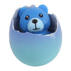 Ours en peluche dans un œuf