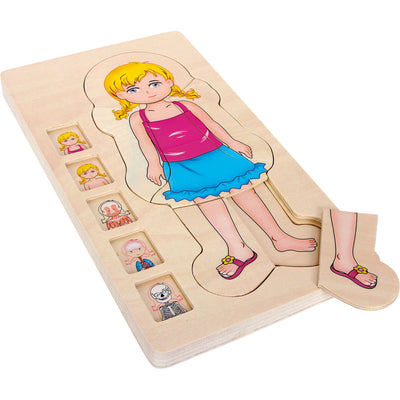 Petite fille de puzzle du corps en bois, 29e.