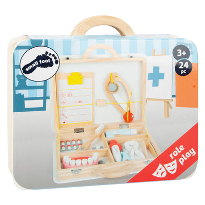Petit médecin en bois et dentiste 2in1 placé dans une valise