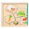 Animaux de puzzle en bois à petit pied et leur nourriture