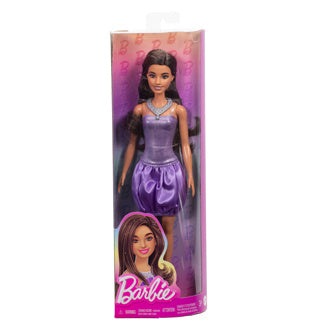 Poupée Barbie fashionista en robe violette à paillettes.