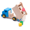 Camion benne en bois Bajo avec blocs bleus.