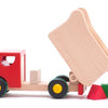 Camion benne en bois Bajo avec blocs rouges.