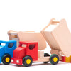 Camion benne en bois Bajo avec blocs rouges.