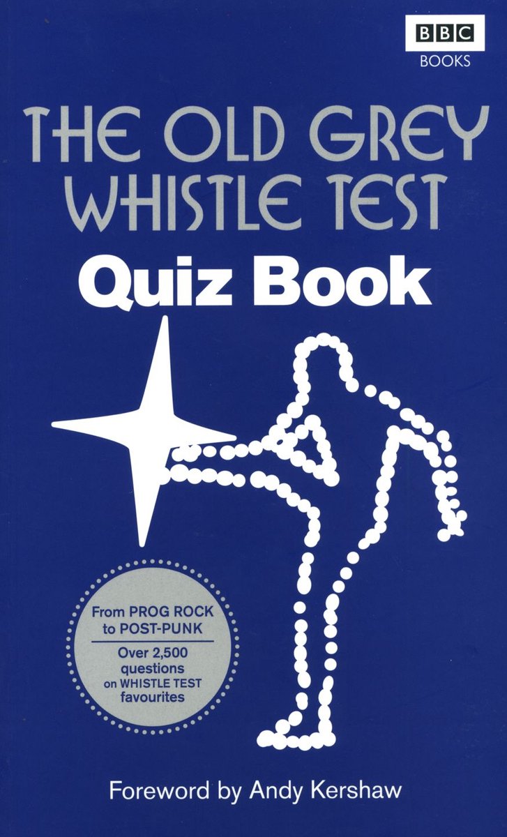 Le vieux livre de quiz de test de sifflet gris