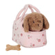 Petit chien en peluche hollandais Jackie dans un sac