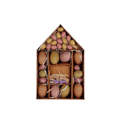 HBx œuf de Pâques naturel vivant rose dans une maison en carton