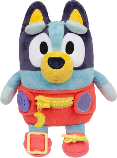 Spectron bébé robe bleue et jouet en peluche