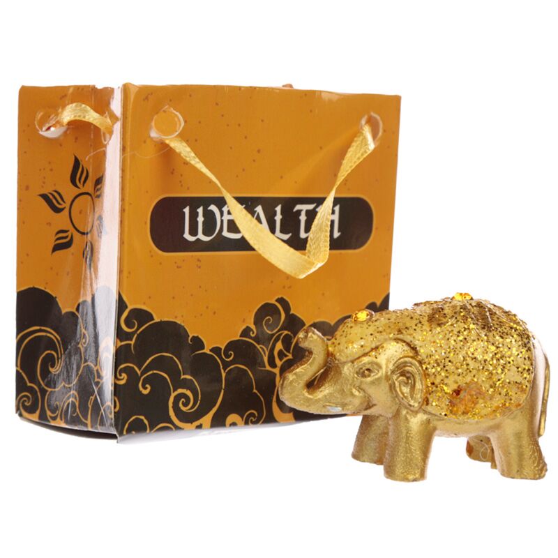Mini éléphant de bonheur des paillettes métalliques dans un sac