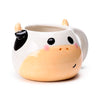 Tasse en céramique formée en vache noire formée