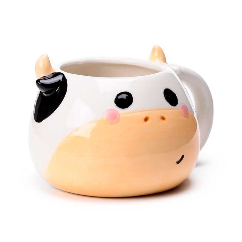 Tasse en céramique formée en vache noire formée