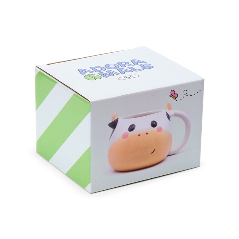 Tasse en céramique formée en vache noire formée