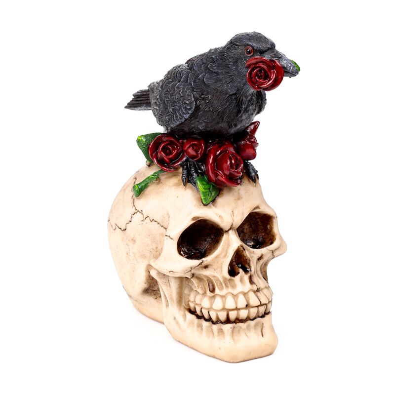 Crâne avec des roses rouges corbeau