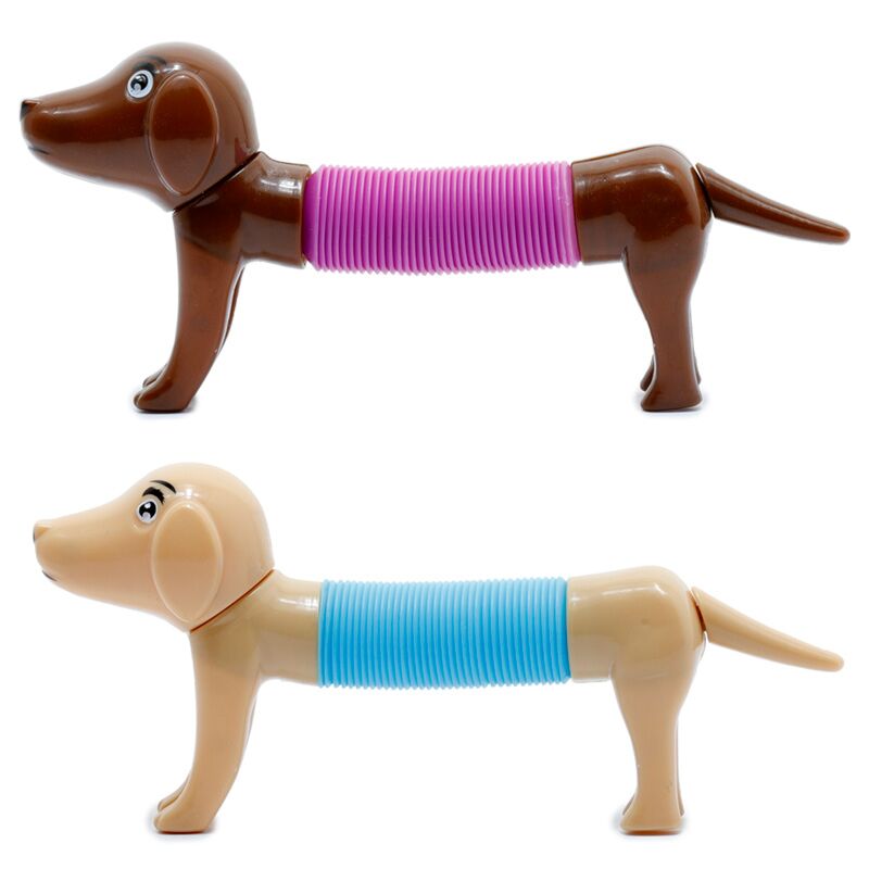 Chien veer agiter les jouets pour enfants