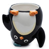 Pingouin à l'envers à la tasse en céramique