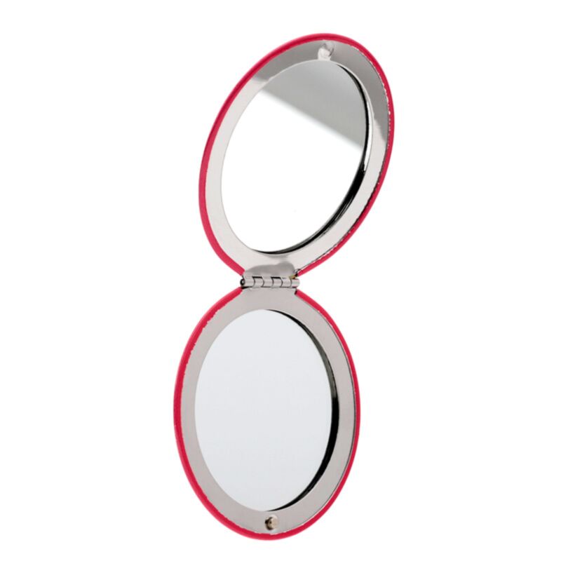Christmas pousse le miroir de maquillage compact sur le chat