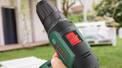 Perceuse universelle Bosch verte 18v | perceuse sans fil | 2 batteries 1,5 Ah + chargeur | y compris accessoires + boîtier système - 06039d4003